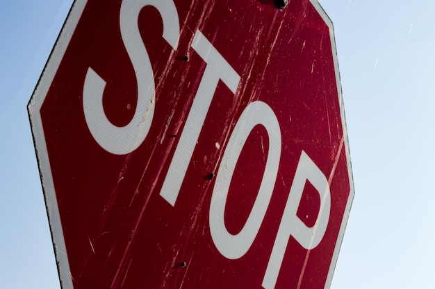 Abstract close up of an old dirty stop sign