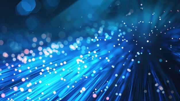 Photo abstract closeup of blue fiber optic strands with sparkling bokeh and light effects depicting data transmission