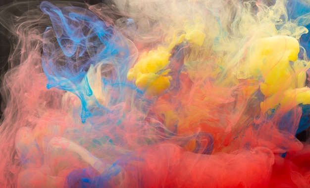 abstract color mix , drop of ink color mix paint falling on water colorful ink in water, color drops in water