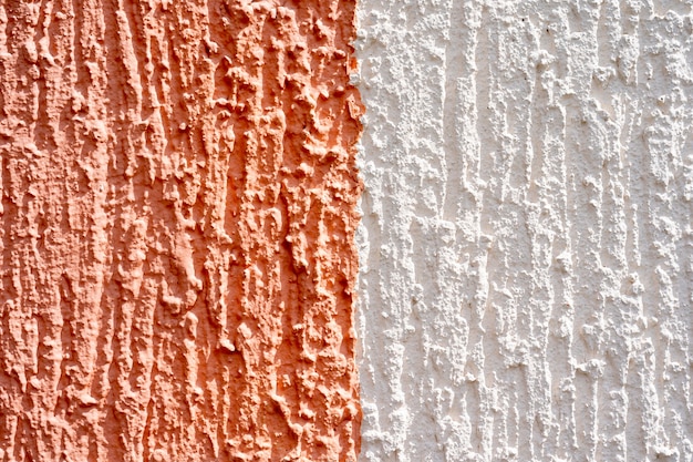 abstract color white and beige rough wall texture background. close up texture white and orange