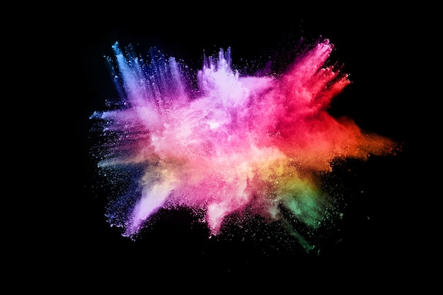 abstract colored dust explosion on a black.abstract powder splatted.