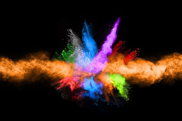 abstract colored dust explosion on a black background.abstract powder splatted background.