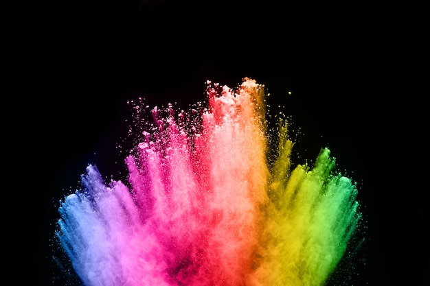 abstract colored dust explosion on a black background.