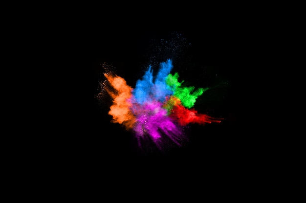 abstract colored dust explosion on a black background. 