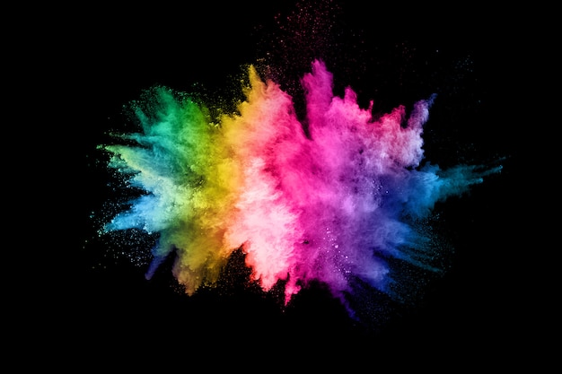 Premium Photo | Abstract colored dust explosion on a black background.