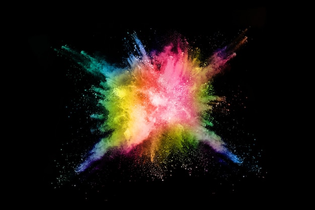 Photo abstract colored dust explosion on a black background