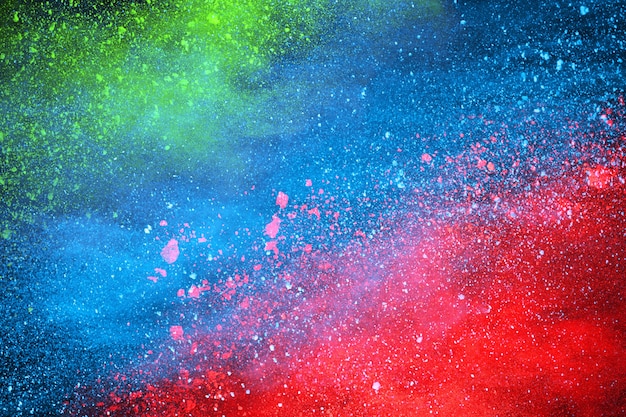 abstract colored dust explosion on a black background