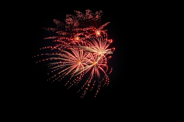 Foto sottragga la priorità bassa colorata del fuoco d'artificio con spazio libero per testo