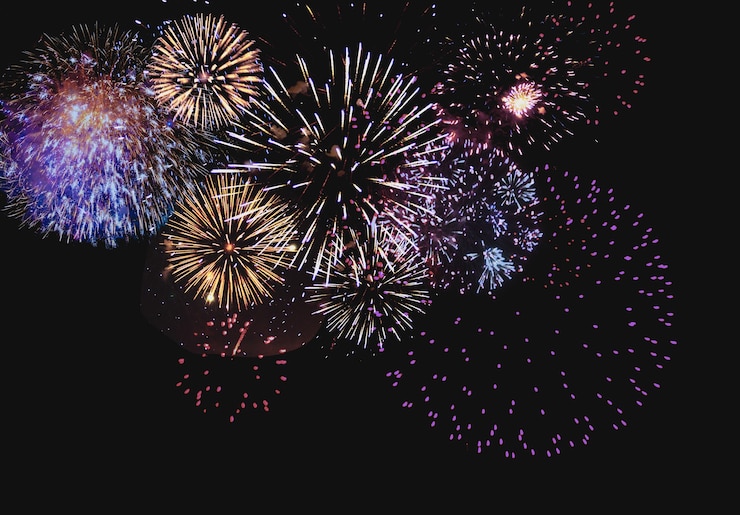 Photo abstract colored firework background with free space for text