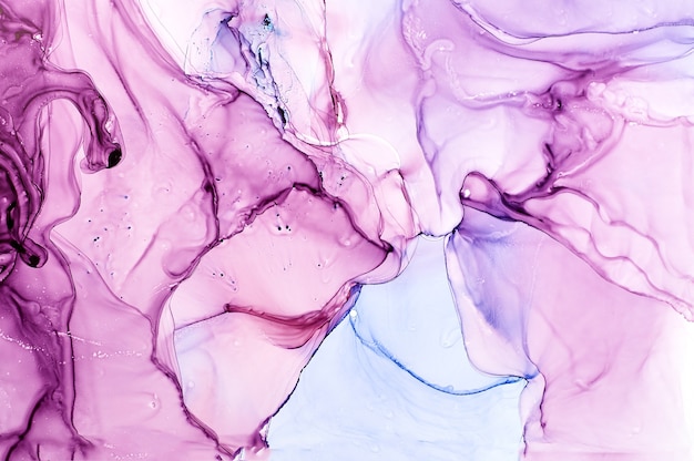 Abstract colorful background, wallpaper. Mixing acrylic paints. Modern art. Marble texture. Alcohol ink colors  translucent