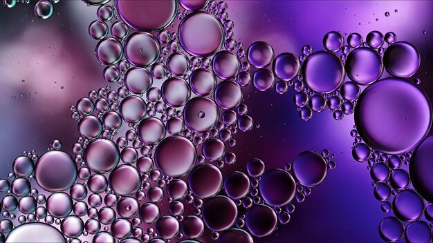 Abstract Colorful Food Oil Drops Bubbles and spheres Flowing on Water Surface Macro Photography