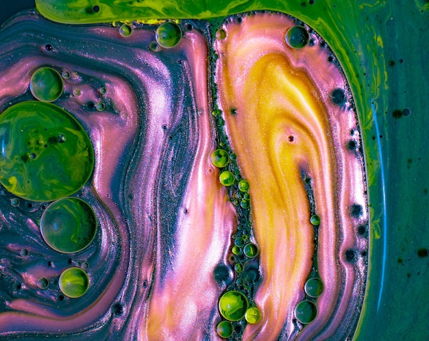 Abstract colorful marble forms for creative designs made with liquid acrylic paint in motion