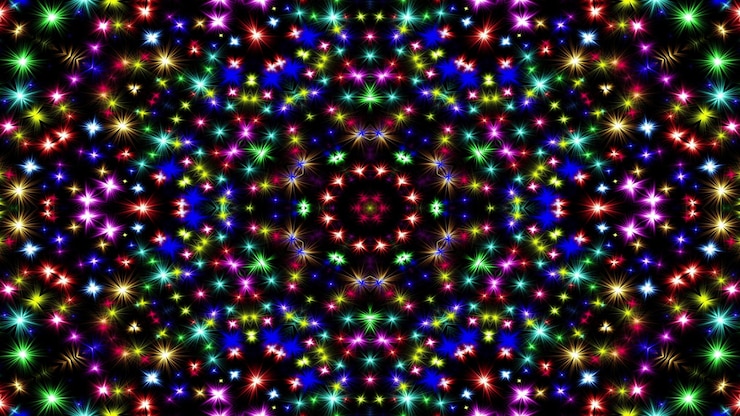 Photo abstract colorful shiny and hypnotic concept symmetric pattern ornamental decorative kaleidoscope movement geometric circle and star shapes