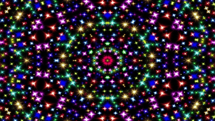Photo abstract colorful shiny and hypnotic concept symmetric pattern ornamental decorative kaleidoscope movement geometric circle and star shapes