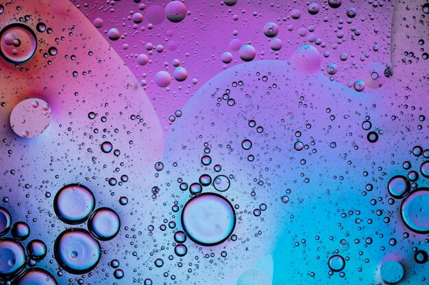 Abstract colourful creative macro oil and water background with bubbles