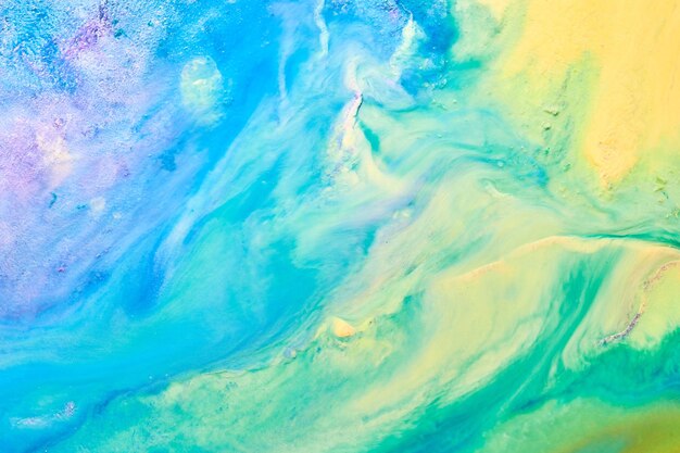 Abstract creative background liquid art paint stains and blots blue yellow alcohol ink multicolored marble texture