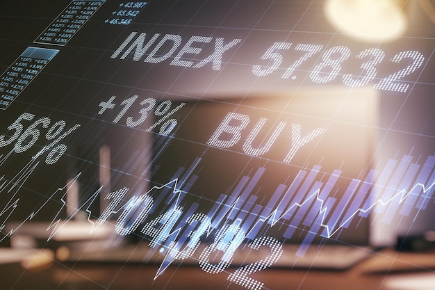 Abstract creative financial graph on modern laptop background forex and investment concept Multiexposure