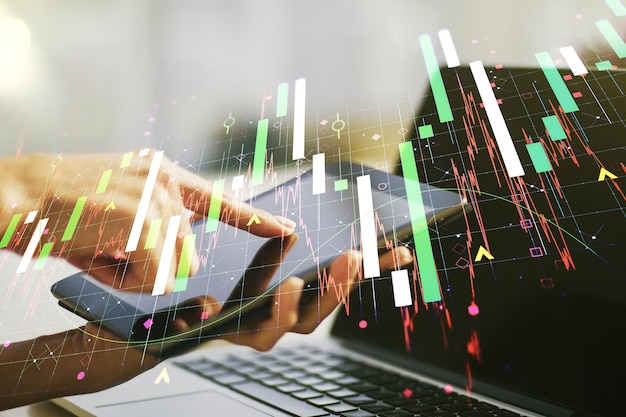 Abstract creative financial graph with finger clicks on a digital tablet on background financial and trading concept Multiexposure