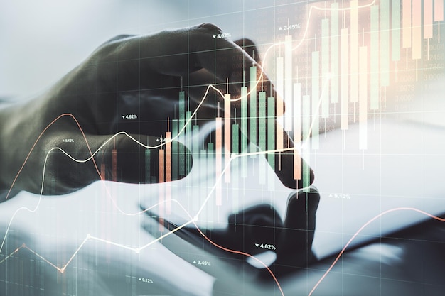 Abstract creative financial graph with finger clicks on a digital tablet on background forex and investment concept Multiexposure