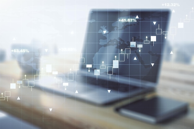 Abstract creative financial graph with world map and modern desktop with computer on background forex and investment concept Multiexposure