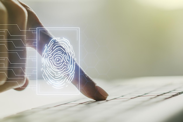 Abstract creative fingerprint illustration with hands typing on laptop on background personal biometric data concept Multiexposure
