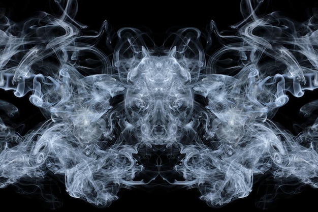 Abstract curls and clouds of smoke forming fantastic silhouettes.