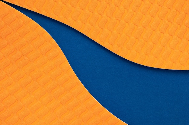 Photo abstract curve orange with blue color paper texture background