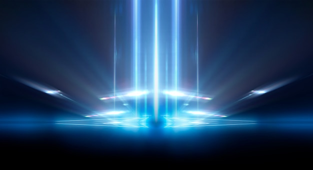 Abstract dark futuristic background Blue neon light rays reflect off the water