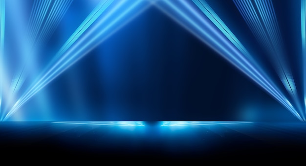 Abstract dark futuristic background Blue neon light rays reflect off the water