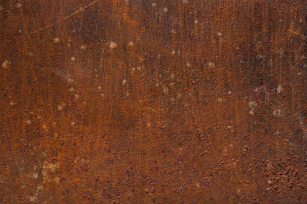 Abstract dark rusty background. Old metal rustic surface with scratches and stains, textured backdrop closeup, top view, copy space