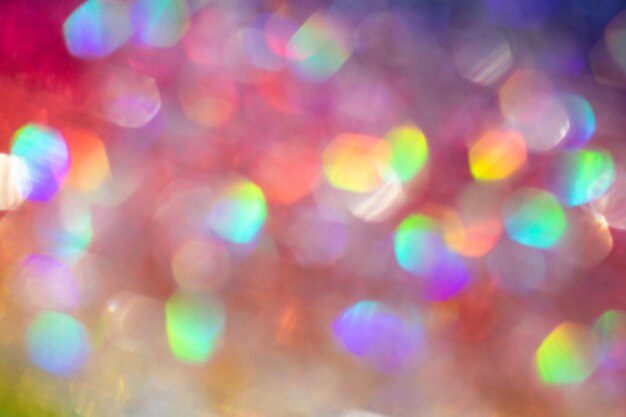 Abstract defocused multicolored background with shining glitter