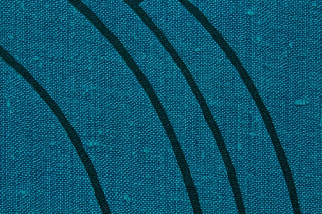 Abstract design background of blue coarse-grained intersection texture of rough fabric with an inter