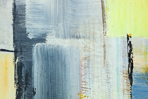 Abstract detail of acrylic paints on canvas Relief artistic background in blue yellow and silver color