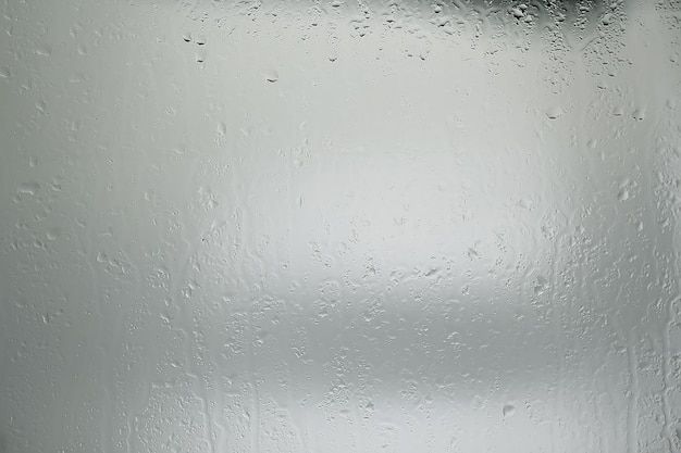 abstract drops glass background / texture fog rain, seasonal background, clear glass with water