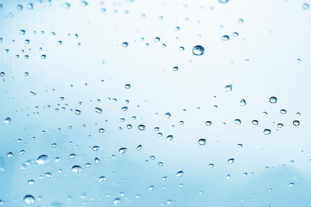 abstract drops glass background / texture fog rain, seasonal background, clear glass with water