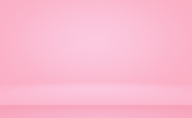 Abstract empty smooth light pink studio room background use as montage for product displaybannertemp...