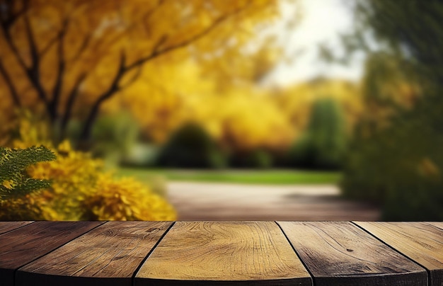 Abstract empty wooden desk tabletop with copy space over autumn trees blurred background display