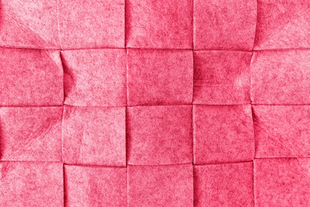 Abstract felt texture background in color of the year 2023 Viva Magenta Square pattern