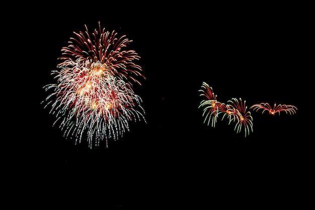 Abstract Fireworks light up the dark sky