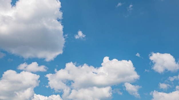 Abstract fluffy clouds in blue sky