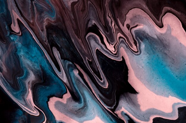 Photo abstract fluid art background blue, pink and black colors. liquid marble. acrylic painting on canvas with brown gradient and splash. alcohol ink backdrop with waves pattern. stone section.