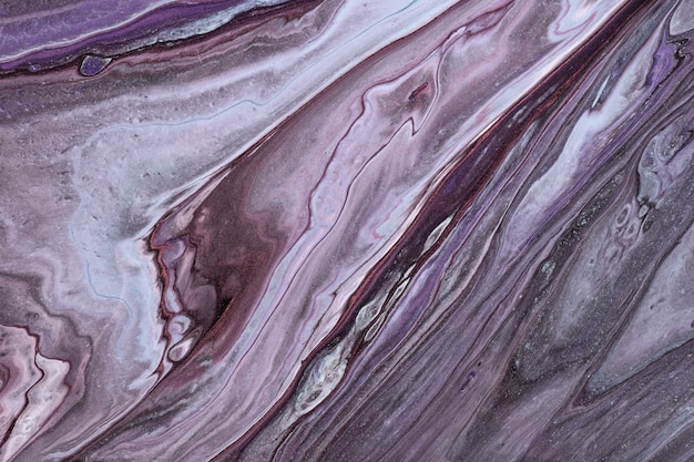 Abstract fluid art background dark purple and gray colors. Liquid marble. Acrylic painting with violet gradient and splash. Watercolor backdrop with brown wavy pattern. Stone marbled section.