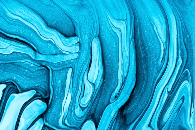Abstract fluid art background light blue and black colors. Liquid marble. Acrylic painting on canvas with turquoise gradient. Watercolor backdrop with aqua wavy pattern. Stone section.