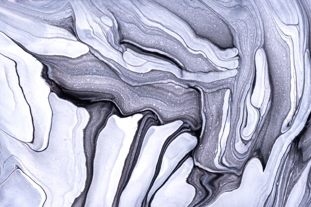 Abstract fluid art background light gray and white colors. Liquid marble. Acrylic painting on canvas with black gradient. Watercolor backdrop with wavy pattern. Stone section.