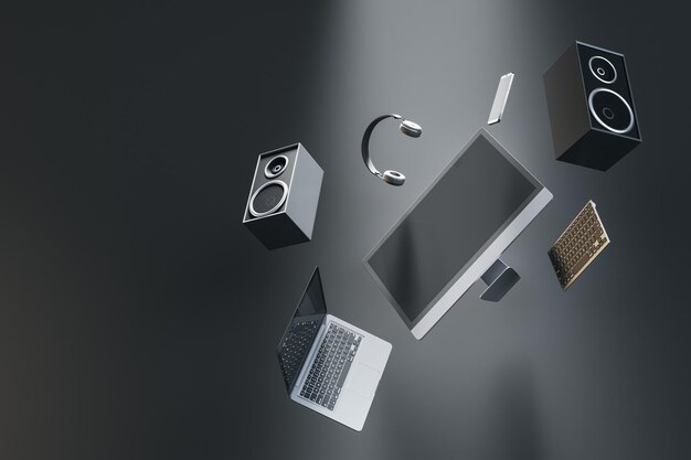 Abstract flying tech pieces on gray background with mock up place Laptop computer speakers and headphones Music and technology concept 3D Rendering