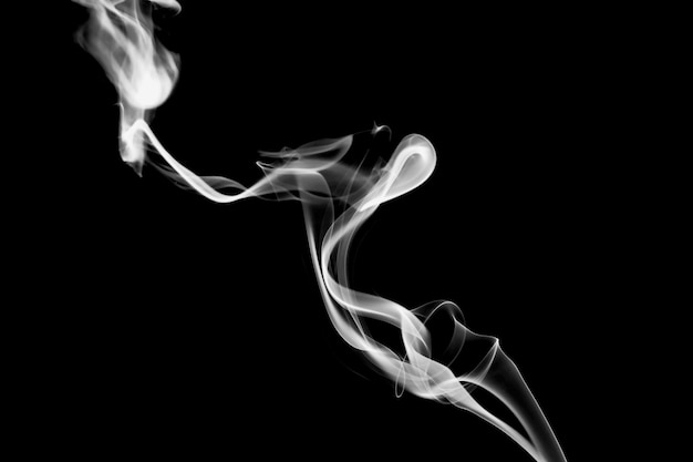 Abstract form of Smoke in black and white on a black background