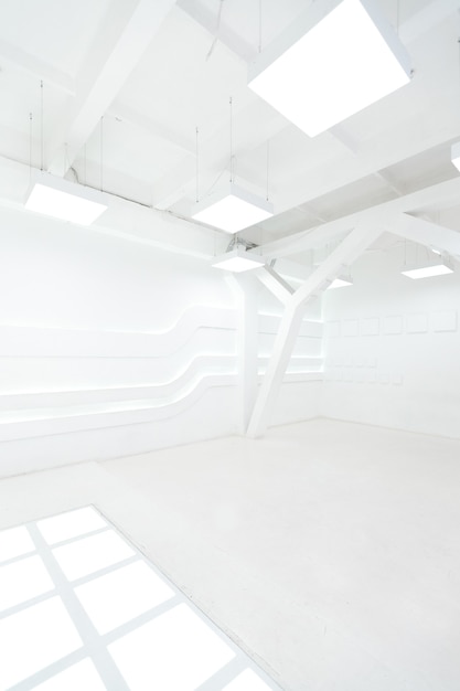 Abstract futuristic empty room interior in white with illumination in the style of a spaceship. geometric decoration on the walls.