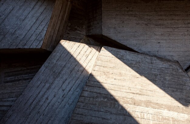 Abstract geometric concrete background  illuminated by sun