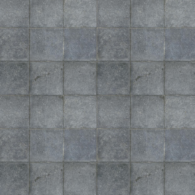 Абстрактная текстура геометрического узора большой напольной плитки, наружная стена из строительных блоков.