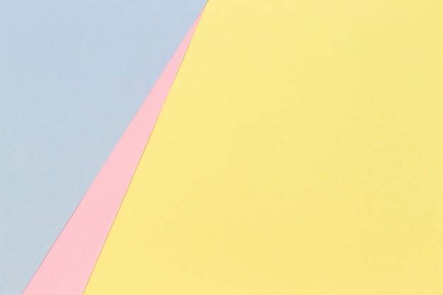 사진 추상적 인 기하학적 모양 파스텔 옐로우 핑크와 블루 컬러 종이 배경